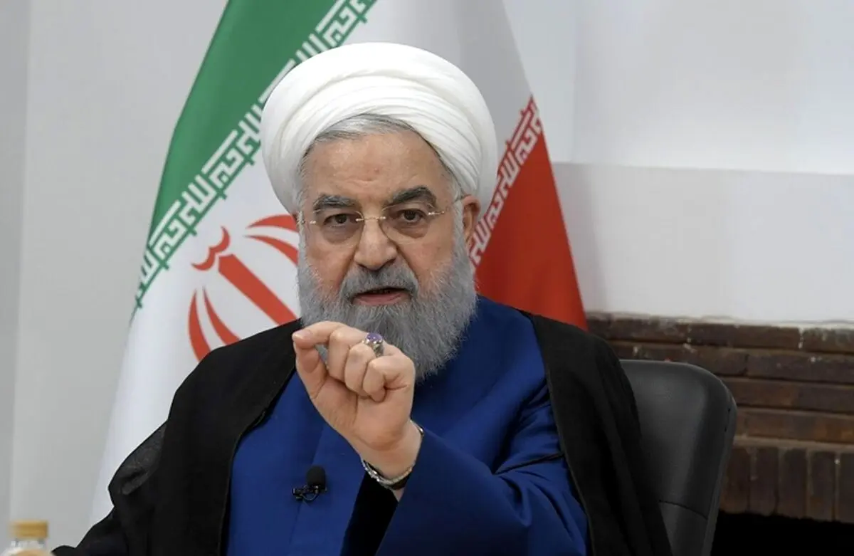 حضور حسن روحانی بر سر مزار والدین خود + عکس