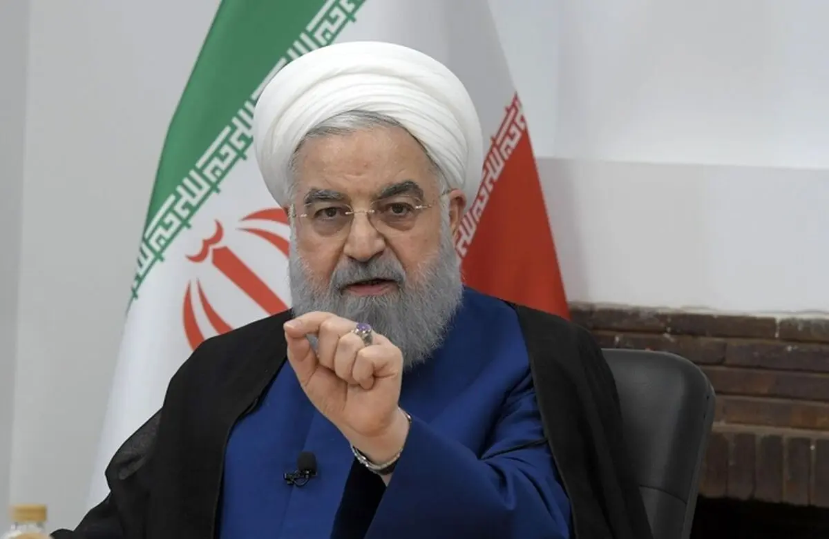 حضور حسن روحانی بر سر مزار والدین خود + عکس